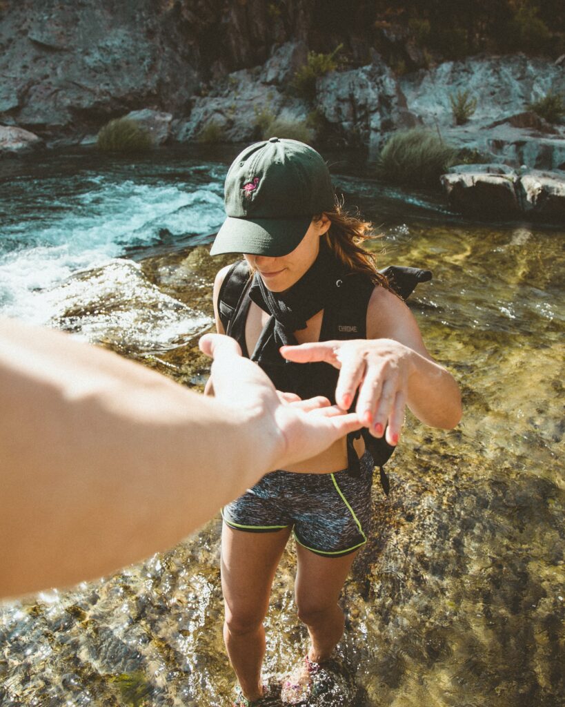 woman about to hold person's hand